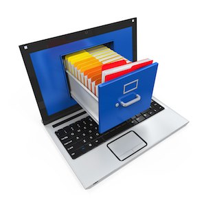 Digital image of a laptop with an open drawer filled with colorful files and folders emerging from the screen.